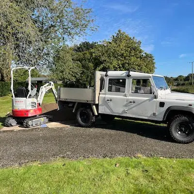 Landrover and mini digger